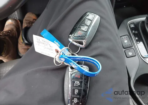 2014 Hyundai Santa Fe Sport 2.4L z USA, uszkodzony, nr VIN 5XYZUDLB9EG209397